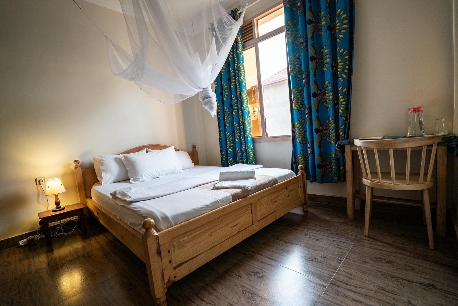 Omx Hotel Kimi Кигали Экстерьер фото