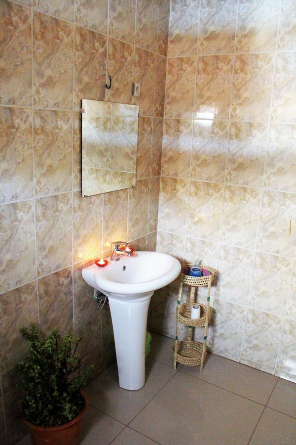 Omx Hotel Kimi Кигали Экстерьер фото