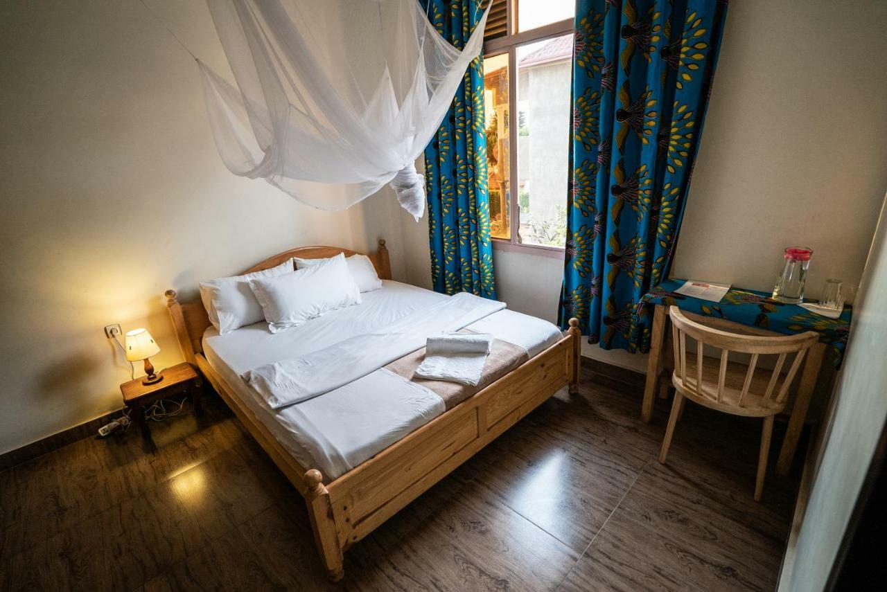 Omx Hotel Kimi Кигали Экстерьер фото